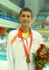 Alejandro Snchez con la medalla de bronce de los 100 metros braza.